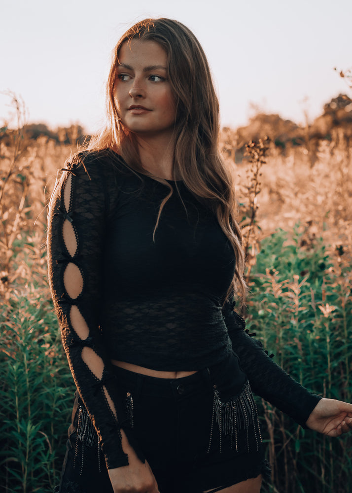 sheer dark colored shirt