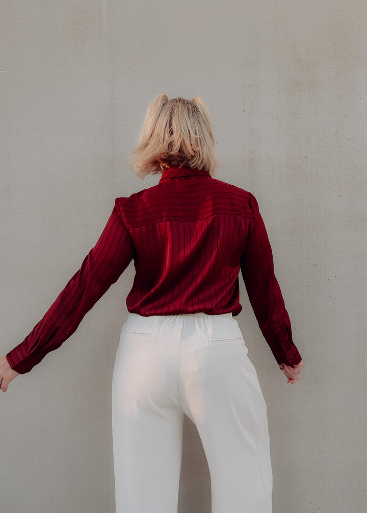 Side of Cranberry Tie Neck Blouse