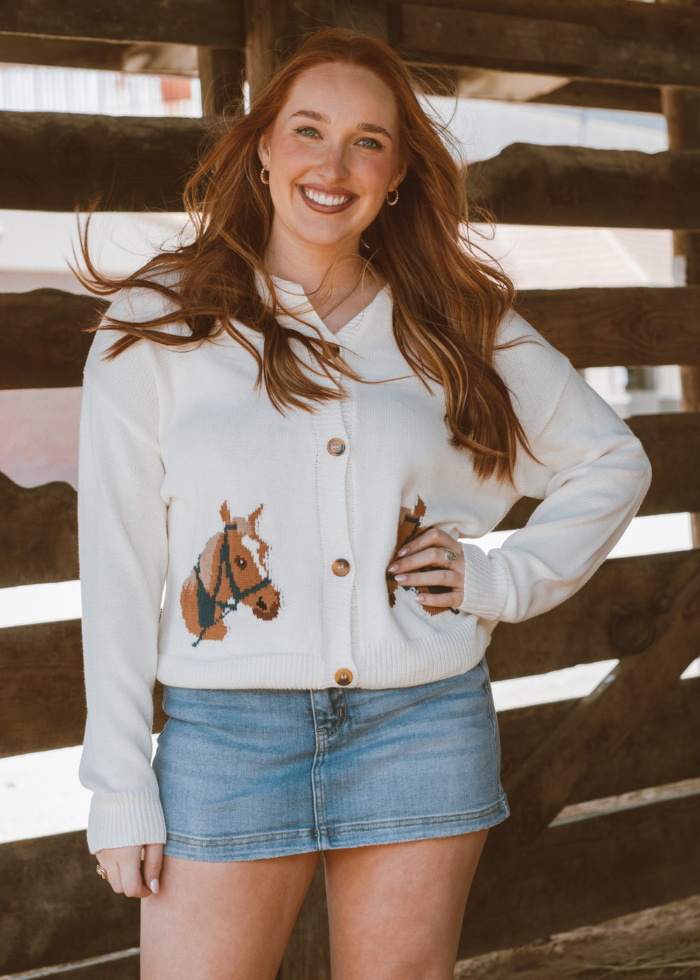 White sweater with horses 
