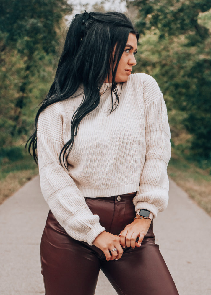 ivory sweater with detailed sleeve