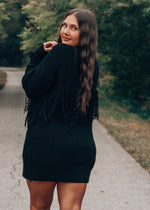 black sweater dress with fringe