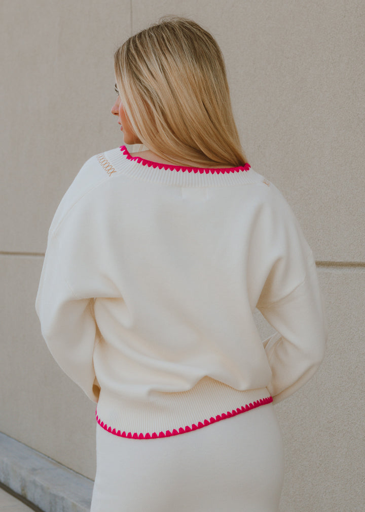 pink trim cardigan