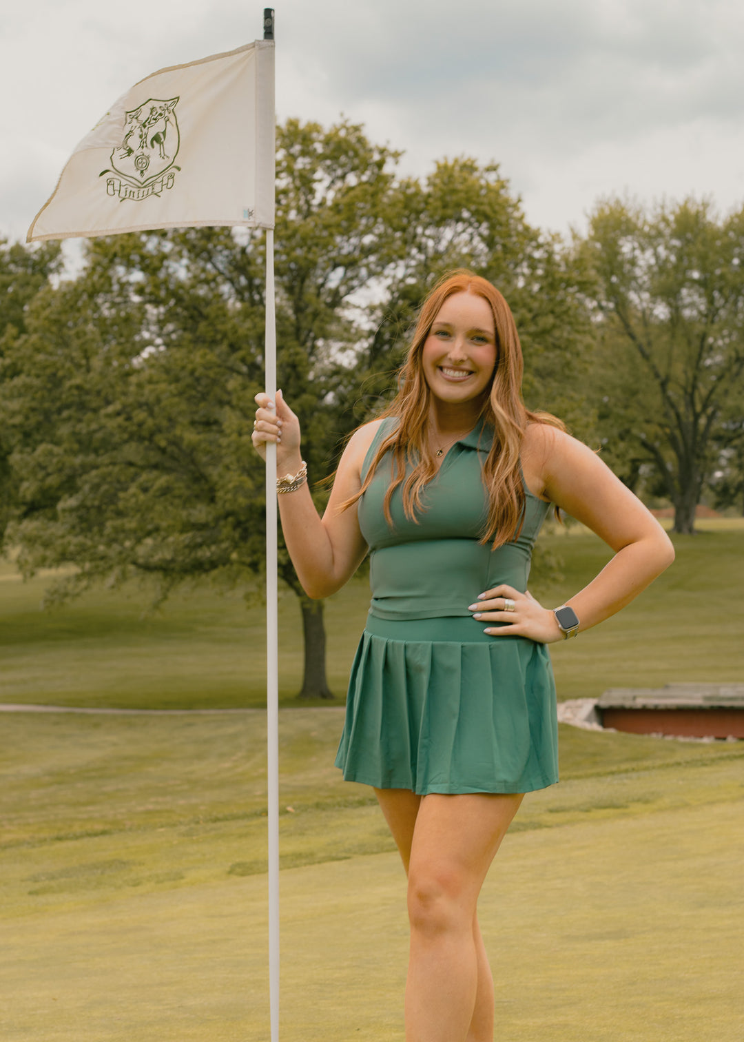 green polo top