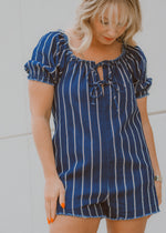 denim material romper, puff sleeve romper, white and red stripped romper, raw hem, bow detail, V-neck romper, fourth of July outfit, summer outfit, lake outfit