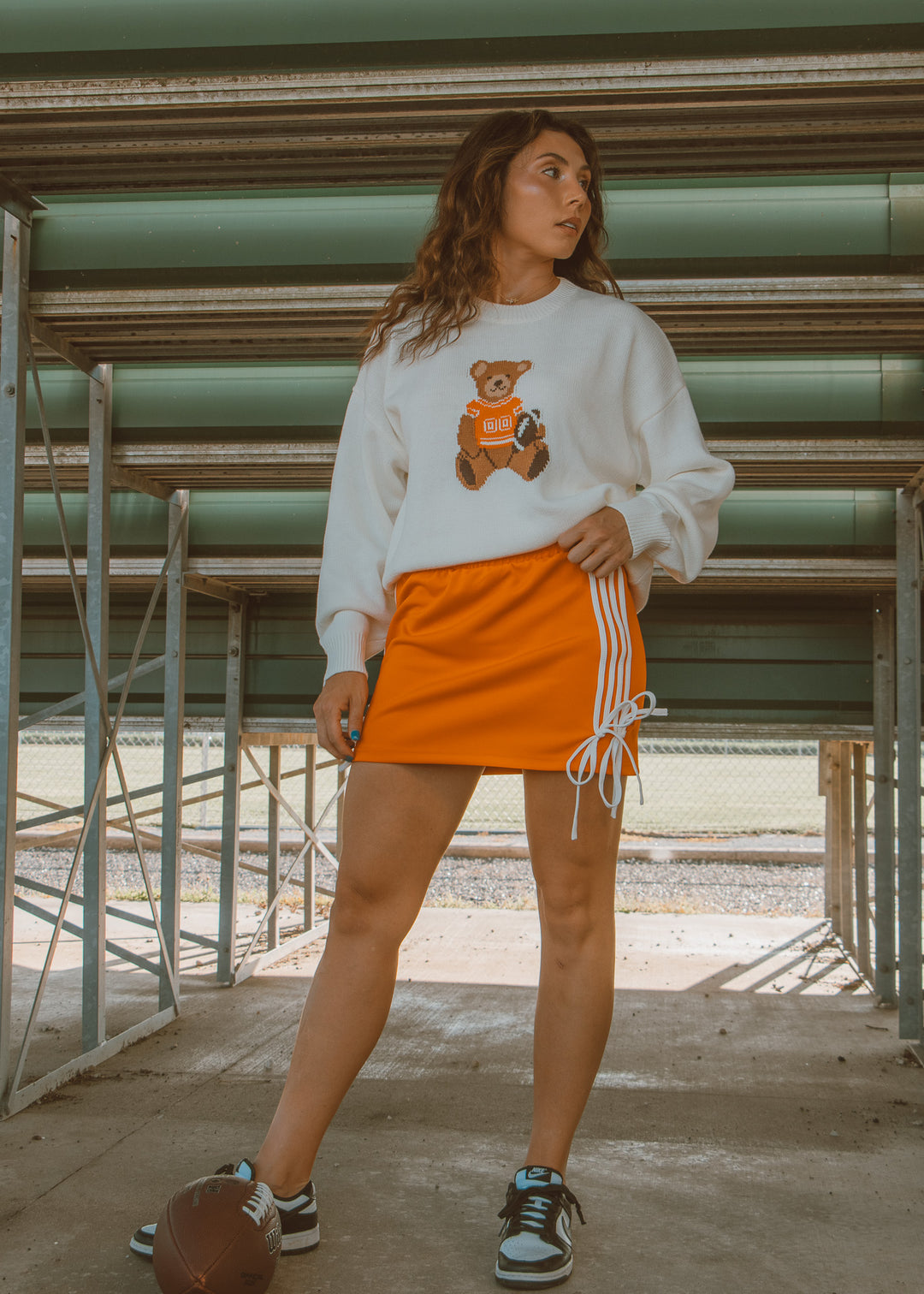 White cozy sweater with gameday bear detail 