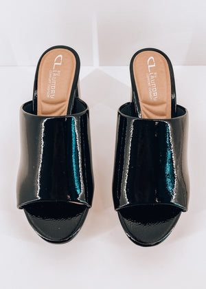 
            
                Load image into Gallery viewer, Get On Black Patent Leather Mule
            
        