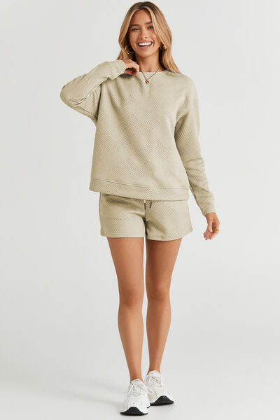 textured long sleeve top and drawstring shorts set